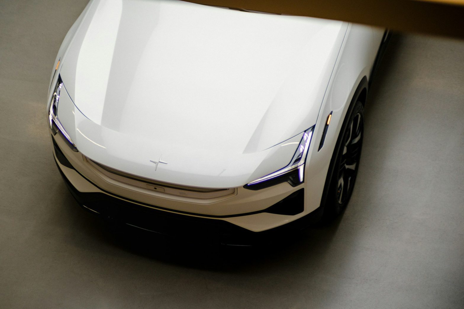 a white car parked in a parking lot